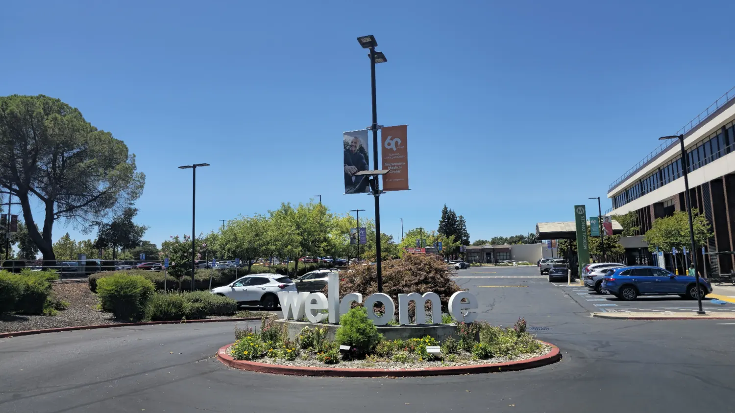 The main entrance drive and visitor parking at Kaiser Permanente Sacramento Medical Center on Morse Avenue